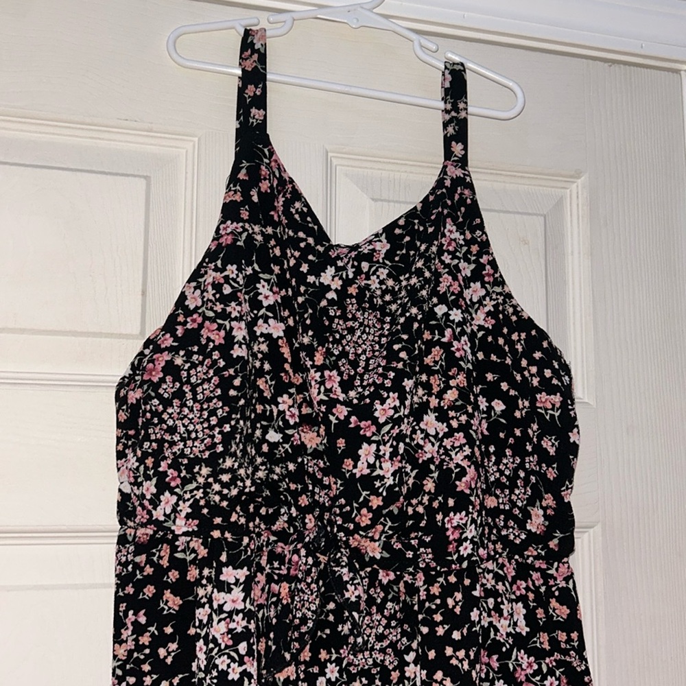 black jumpsuit with flowers